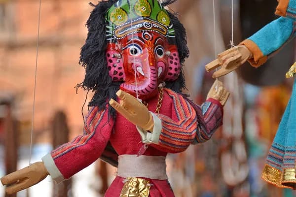 Traditional handmade Ganesha string puppet displayed as a local handicraft souvenir in Nepal