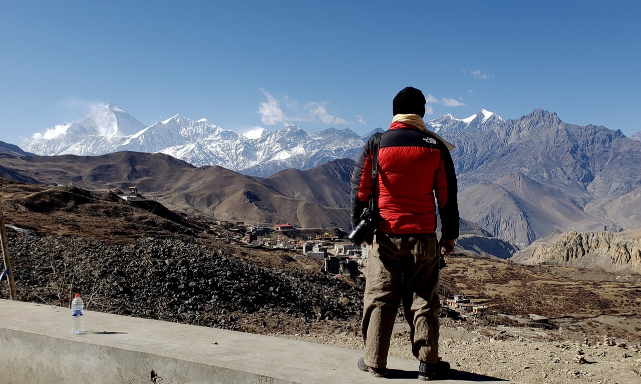 Local citizens standing in an organized queue at a designated community voting center in Nepal during the March national elections.
