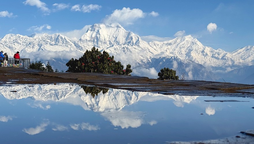 reflection of mt dhaulagiri from the poon hill viewpoint